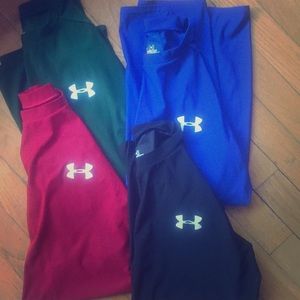 Bundle of Under Armour heat gear shirts.
